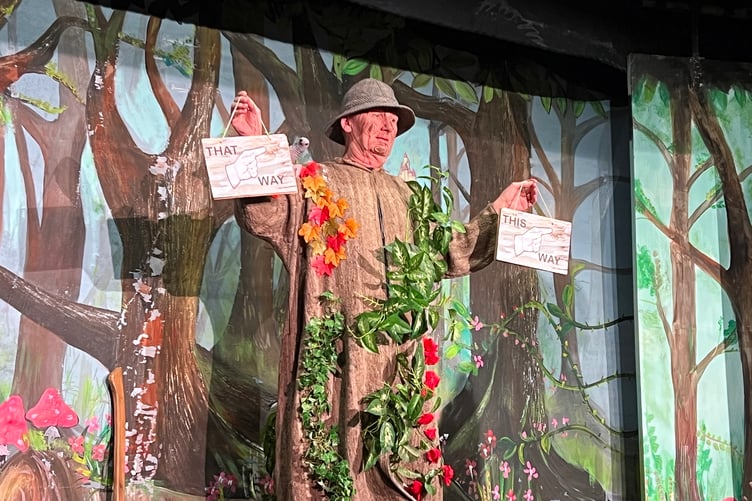 Bill Thynne played the 'signpost'