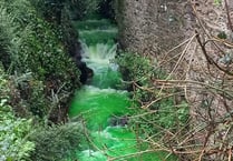 'Harmless' dye turns river fluorescent green 