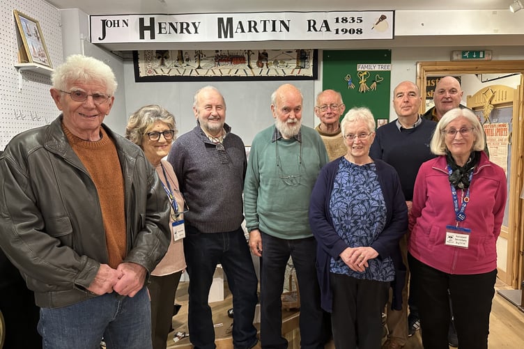 Members of Saltash Heritage team with guests at the exhibition preview