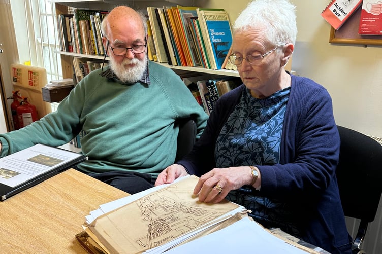 David and Rosie Wilesmith with the sketches by local artist, John Henry Martin