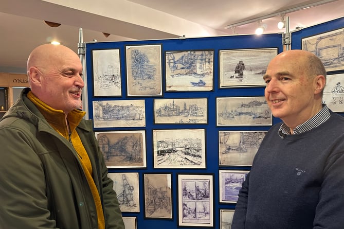 Great grandsons of John Henry Martin, Glynn Tomkins and Gary Pickard with copies of the artist's sketches