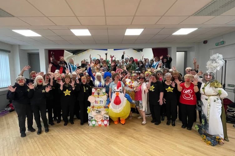 The Rock Choir celebrating their fundraising efforts