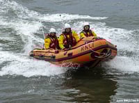 Teenager rescued after getting cutting off by tide
