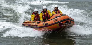 Teenager rescued after getting cutting off by tide