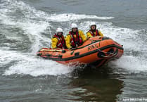 RNLI crew rescue three people cut off by tide near Looe