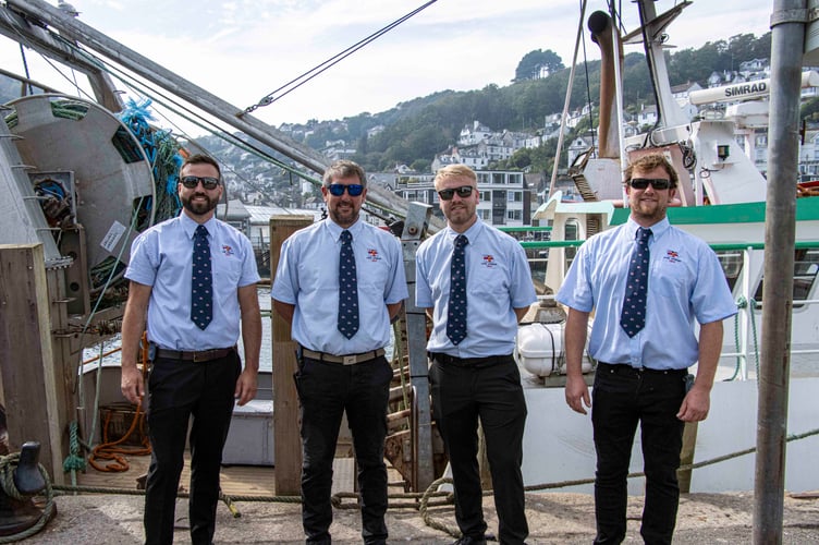 Looe RNLI volunteer crew Aaron Rix, David Jackman, Goron Jones and Jack Spree taking a break from filming 