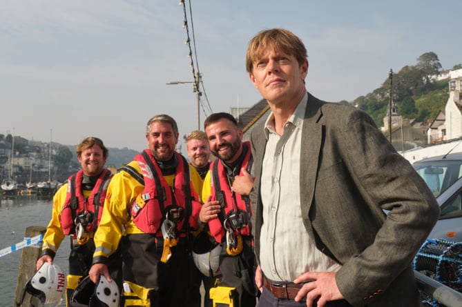 Looe RNLI volunteer crew Jack Spree, David Jackman, Goron Jones and Aaron Rix with Kris Marshall on East Looe Quay during filming. (Picture: BBC / Red Planet Pictures / Joss Barratt)