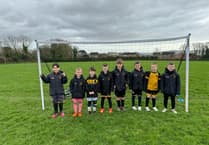 Money seized from criminal activity used to fund new coats for Under 8s football team