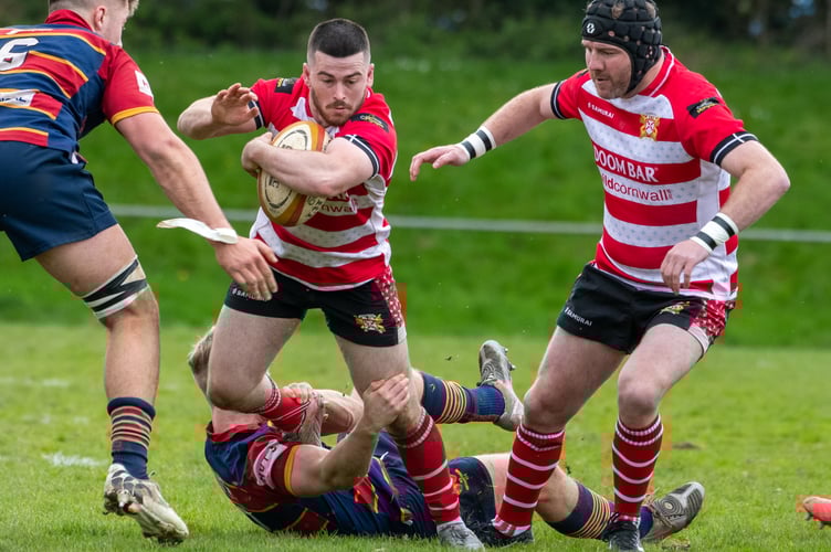 St Austell winger Dan Tyrrell on the ball against Old Northamptonians on Saturday as the returning Miles Davey offers support.
