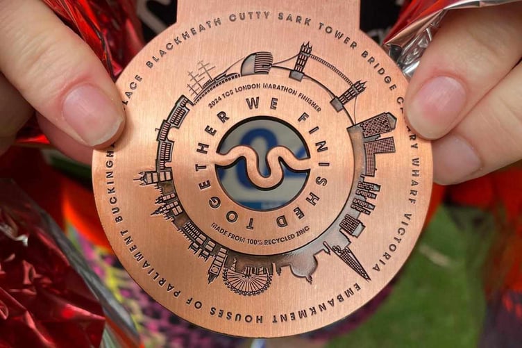 Morwenna received a medal for completing the marathon