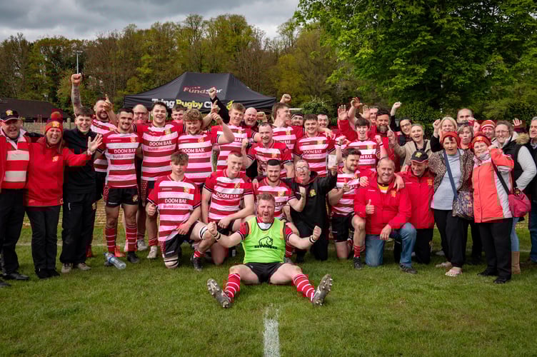 St Austell's players and supporters celebrate their victory at Tring on Saturday.