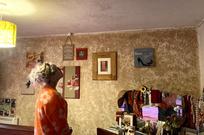 MD_DCM_Liz Pannell in her bedroom which has mould on the ceiling. She lives in a Cornwall Council owned property in Cowdray Close of Saltash and has had issues with damp and mould in her property for the past two years.