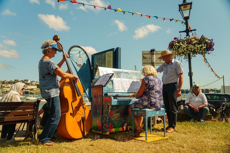 A pop up piano session in the waterfront