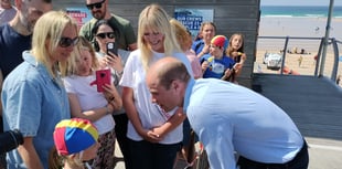 Prince William plays volleyball and meets lifeguards