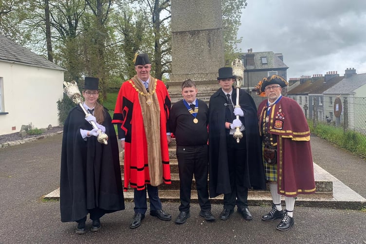 The mayor of Liskeard, the town crier, mace bearers and the mayors consort Daniel Cassidy at the event