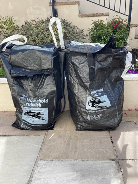 seagull-proof sacks with white handles
