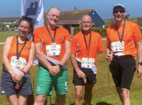 Looe runners tackle ten kilometre race in blazing sun 