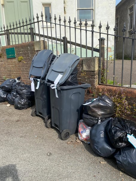 Rubbish left behind on collection day in Millbrook because it was not in the right bin – but weeks in to the new system, some people had still not received the new wheelie bins