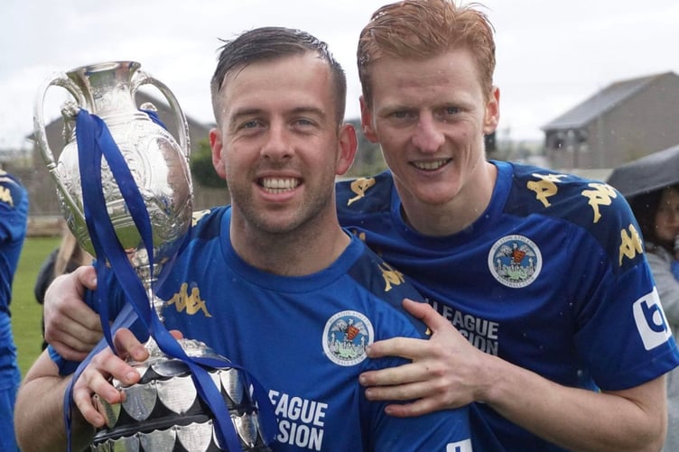 Rikki Shepherd (right) pictured celebrating winning the Western League Premier Division title last season with Helston Athletic last season, is struggling for fitness. Picture: Helston Athletic AFC