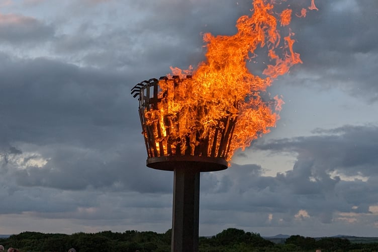 A flame was lit on the memorial beacon erected as part of the '80 Beacons' initiative