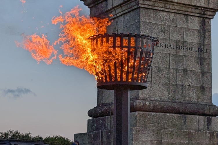 The memorial beacon in front of the obelisk at Bodmin Beacon