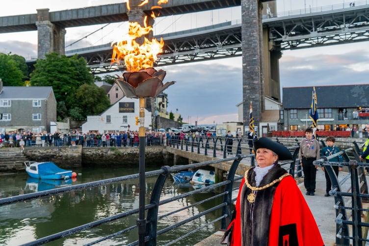 Mayor of Saltash Cllr Julia Peggs with the beacon