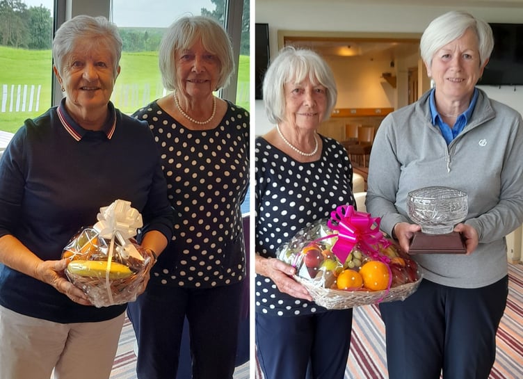 Rose Bowl organiser Wendy Phillips hands out the prizes to the respective winners, Hazel Beadle (left) and Sue Wenmoth.