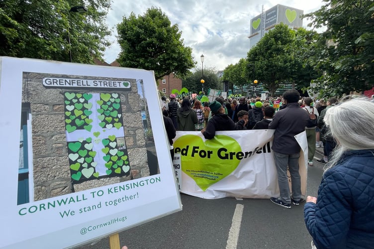 Cornwall Hugs banner on Grenfell Silent Walk - Cornwall Hugs