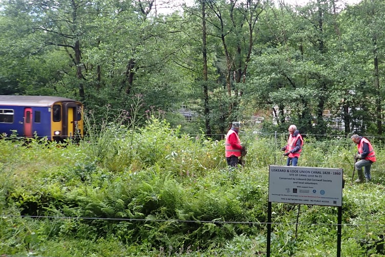Volunteers working on the old Liskeard and Looe Union Canal lock
