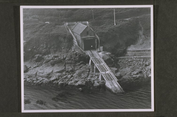 Penlee lifeboat station with its slipway. This photo is in black and white.