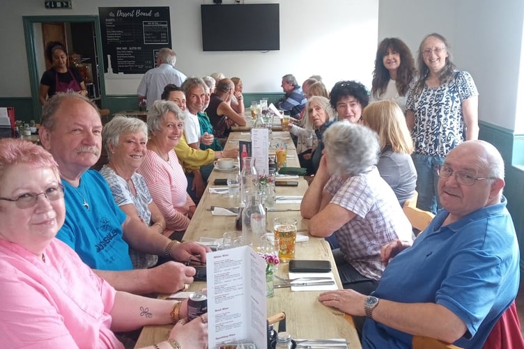 THE group celebrate at Louis Tea Rooms