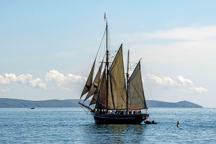 Tall ship Bessie Ellen sailing past Looe as she makes way to her home port of Sutton Harbour, Plymouth.