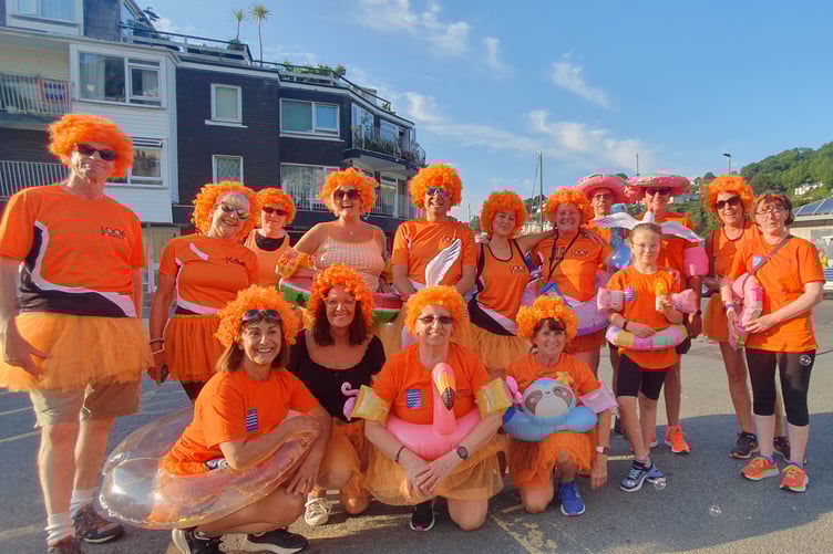 Looe Pioneers in their usual orange wigs and tutus are never far from the fun at Looe carnival week!