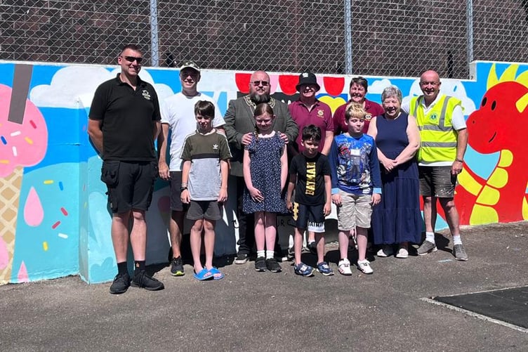ARTIST Brad Waters, porteeve Steve Pound and guests at the official unveiling of the new mural