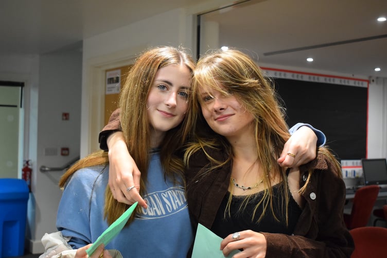 Nell McCaffrey and Romy Richardson receiving their results