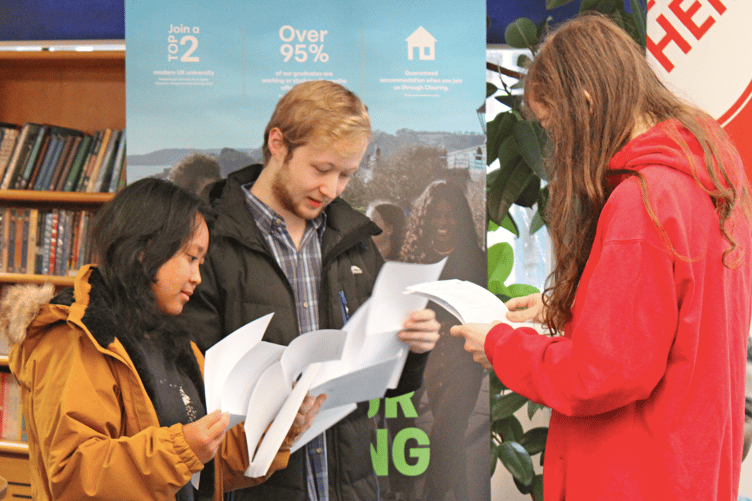 Students anxiously opened their results, hoping that their hard work had paid off