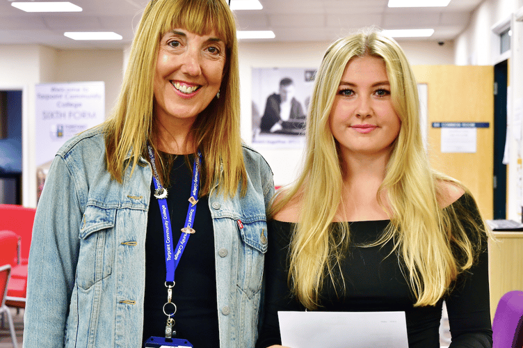 Maddie with miss Bell Maddie has a three year degree apprenticeship with Morrisons (Picture: Andy Campfield)