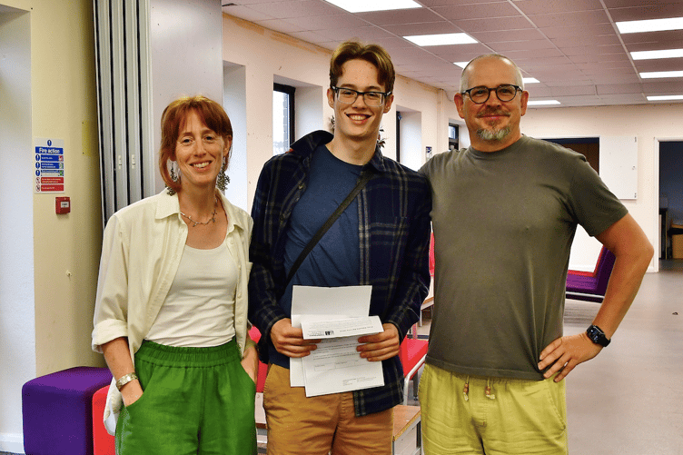 Jake with his proud parents, Jake off to study mechanical engineering at Exeter University (Picture: Andy Campfield)