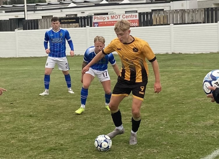 Torpoint's recent recruit, attacker Will Sullivan, in possession against Buckland Athletic at The Mill on Saturday. Picture: Robbie Morris