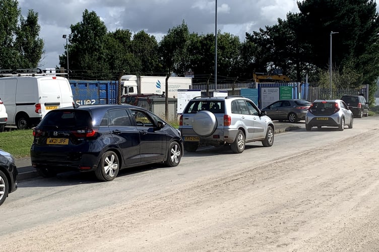 Traffic queuing at the Saltash HWRC site in Tamar View Industrial Estate.