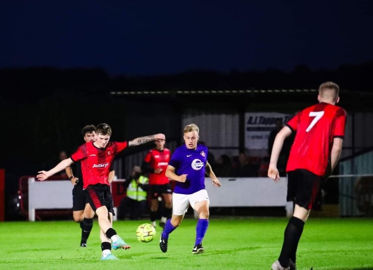 Charlie Castlehouse bangs in a superb third goal for Dobwalls against Millbrook at Lantoom Park on Wednesday night. Picture: Colin Hilton