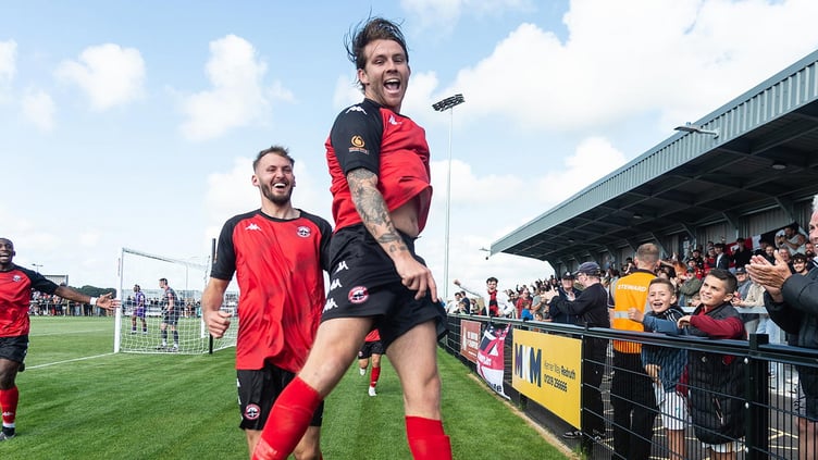 Tyler Harvey celebrates one of his two goals against Enfield Town on Saturday. Picture: Colin Bradbury
