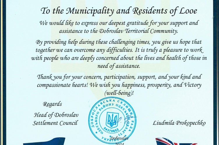 A certificate of appreciation from Dobroslav presented to the group thanking the municipality and residents of Looe.