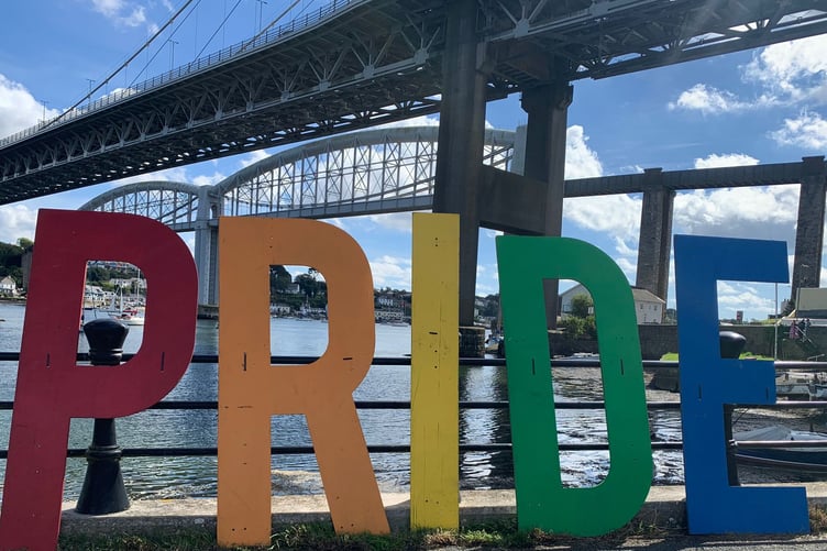 Charlie Nicholas, 8, pictured with host for Waterside festivities, Drag Queen Mandy Anne-Ket and entourage.