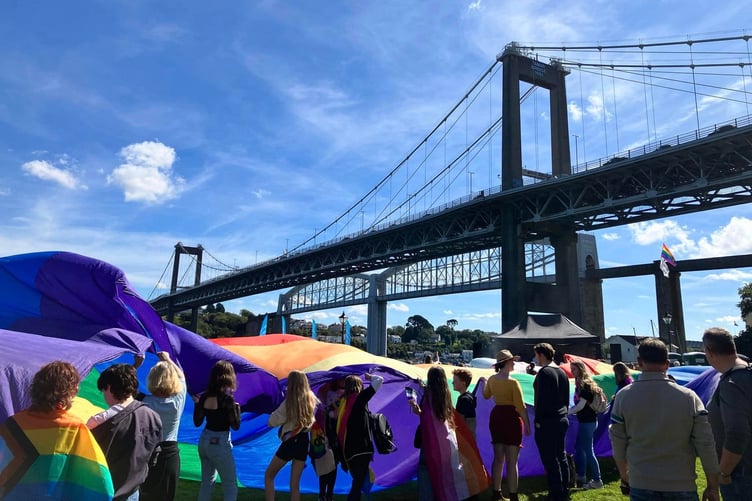 World's largest Pride flag filled the Jubilee Green space under the iconic two bridges that span the river Tamar.
