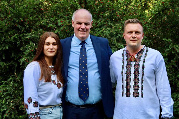 LISKEARD councillor Simon Cassidy with mayor of Kopychyntsi Bogdan Kelichavyi and his wife Maria
