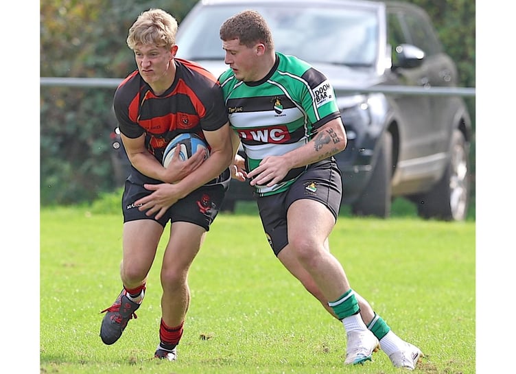 Winger Dan Crowther, pictured on the ball, scored his first Liskeard-Looe try at Lux Park. Picture: Glen Rogers