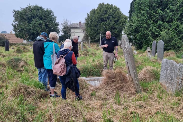 NEIL Walsh shows the group around St Martin's cemetery in Liskeard