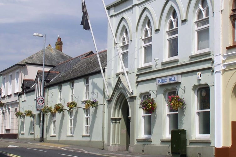 THE council meeting at Liskeard's Public Hall was adjourned after threatening comments were made