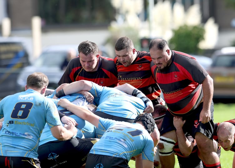 Liskeard-Looe's front row of TJ Hicks (right), Archie Doidge (centre) and Jack Wilton prepare for a scrum against Veor on Saturday. Picture: Glen Rogers